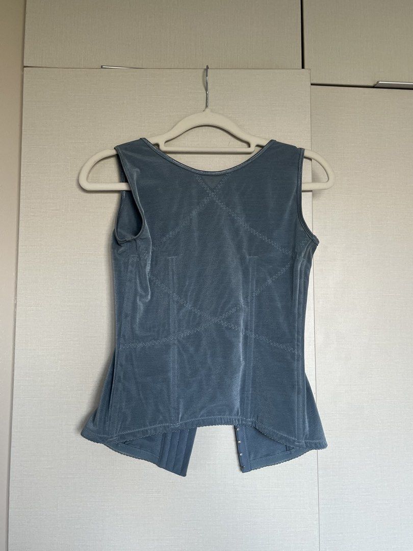 Blue Lace Corset Top with Hook and Eye Closure (Category: Others Tops) located in Makati City. Submitted by doesnotsparkjoyanymore (Listing ID 1450370950, Image 2). Description: - Blue corset top - Lace detailing on the front - Hook and eye closure at the front - Sleeveless design - Excellent for shaping and layering - Comfortable to wear - Please check photos for more details.