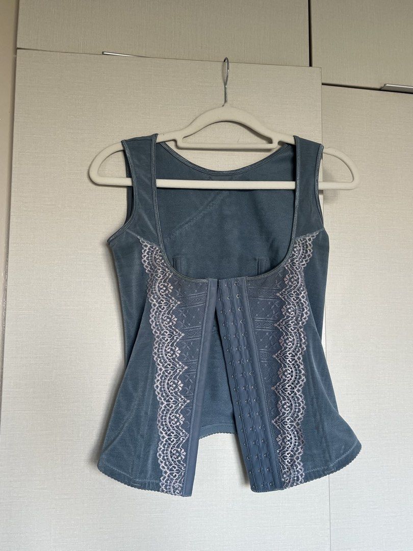 Blue Lace Corset Top with Hook and Eye Closure (Category: Others Tops) located in Makati City. Submitted by doesnotsparkjoyanymore (Listing ID 1450370950, Image 1). Description: - Blue corset top - Lace detailing on the front - Hook and eye closure at the front - Sleeveless design - Excellent for shaping and layering - Comfortable to wear - Please check photos for more details.