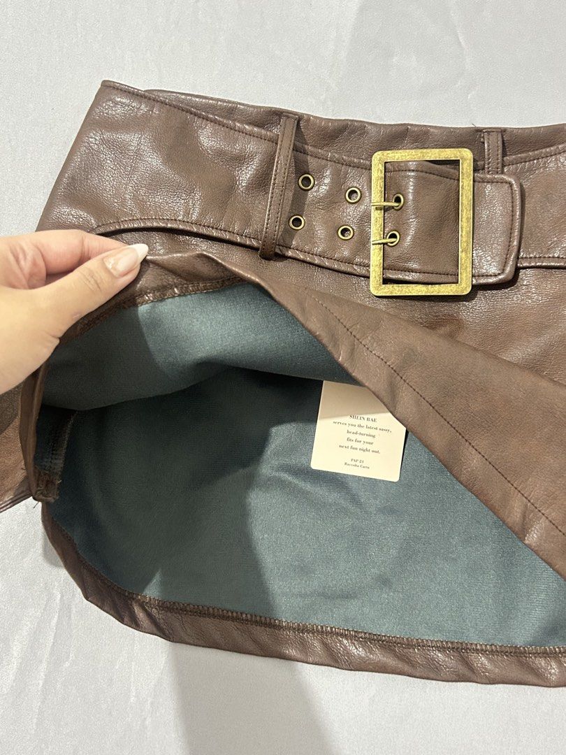 Brown Leather Skirt (Category: Skirts) located in Lucena. Submitted by lexshiine (Listing ID 1450464174, Image 2). Description: size: xs on tag 26-29 length: 13inch MOP: MariBank/Gcash MOD: J&T.