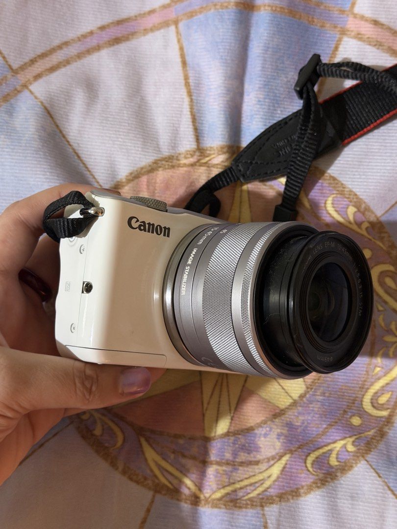Canon EOS M10 Mirrorless Camera (Category: Cameras) located in Paranaque City. Submitted by vix610 (Listing ID 1450499688, Image 3). Description: Canon EOS M10 (2015), 16 megapixels Message for sample pictures Mirrorless camera with Wi-Fi transfer capabilities. Used but not abused. Very good condition. Issues: No port cover, very slight vignette, no original lens cap. No issues that affect picture quality in any way. Inclusions: Camera itself, or