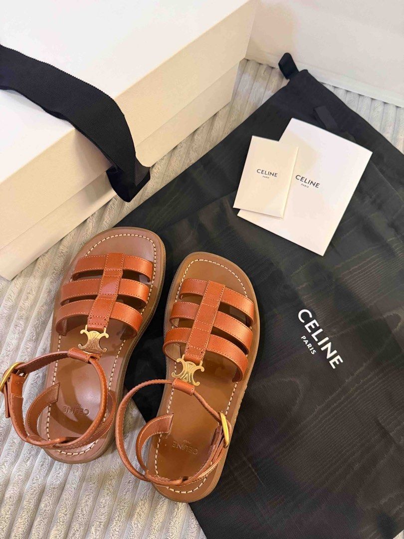 Celine Triomphe Chunky Sandals Tan Leather (Category: Sneakers & Footwear) located in Manila. Submitted by jpal21 (Listing ID 1450345999, Image 2). Description: - Authentic Celine Triomphe Chunky sandals - Color: Tan leather (size 35) - Features iconic Triomphe logo hardware - Complete inclusions with receipt (bought in greenbelt) -38k negotiable.