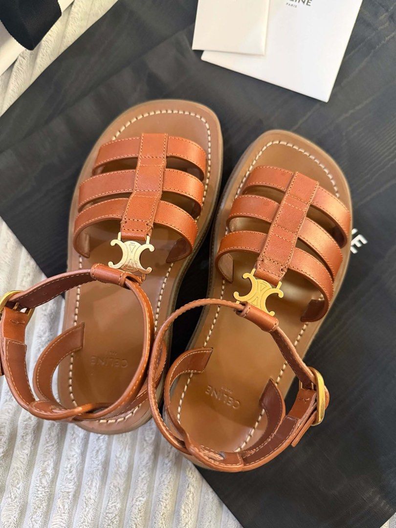 Celine Triomphe Chunky Sandals Tan Leather (Category: Sneakers & Footwear) located in Manila. Submitted by jpal21 (Listing ID 1450345999, Image 3). Description: - Authentic Celine Triomphe Chunky sandals - Color: Tan leather (size 35) - Features iconic Triomphe logo hardware - Complete inclusions with receipt (bought in greenbelt) -38k negotiable.