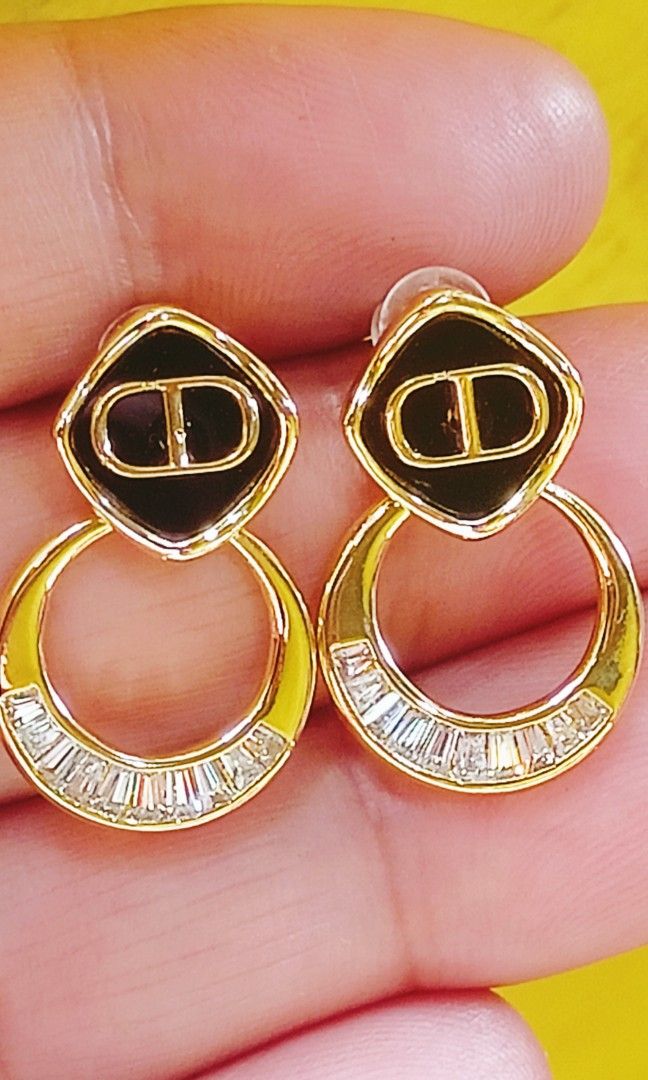 Christian Dior earrings from japan (Category: Luxury Accessories) located in Manila. Submitted by osaze_27japanbags (Listing ID 1450343845, Image 1). Description: Cd earrings from japan no flaws with stamp,hallmark with gift box kindly pm me.
