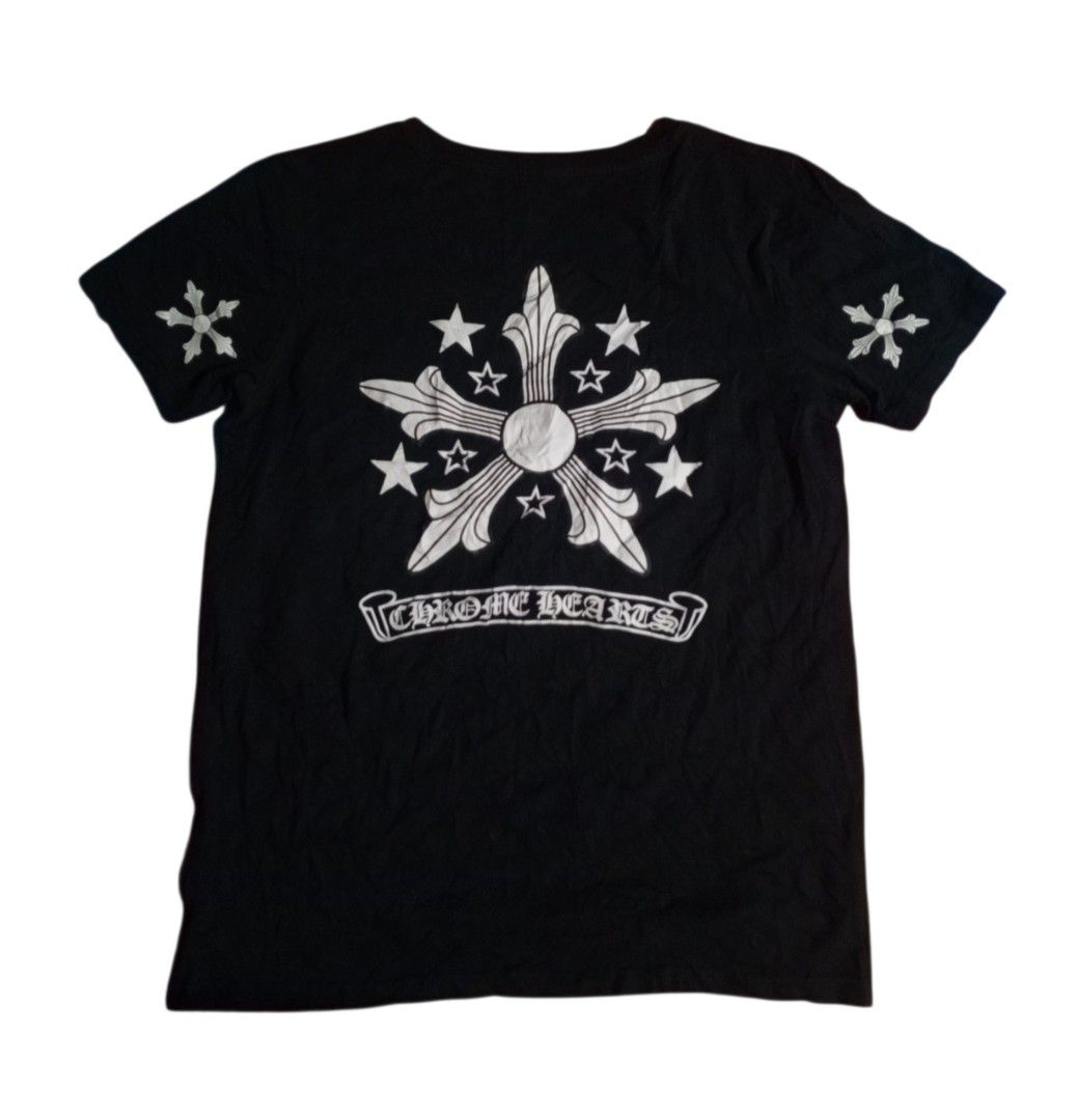 Chrome Hearts Black T-Shirt (Category: Tshirts & Polo Shirts ) located in Manila. Submitted by kents_thrift (Listing ID 1450500597, Image 2). Description: -Chrome hearts (19x25.5) - Small - Black Chrome Hearts T-shirt - Classic Chrome Hearts logo on the front pocket - Large, eye-catching graphic design on the back - 'CH' logo detail on the bottom left hem - Essential piece for any Chrome Hearts enthusiast.