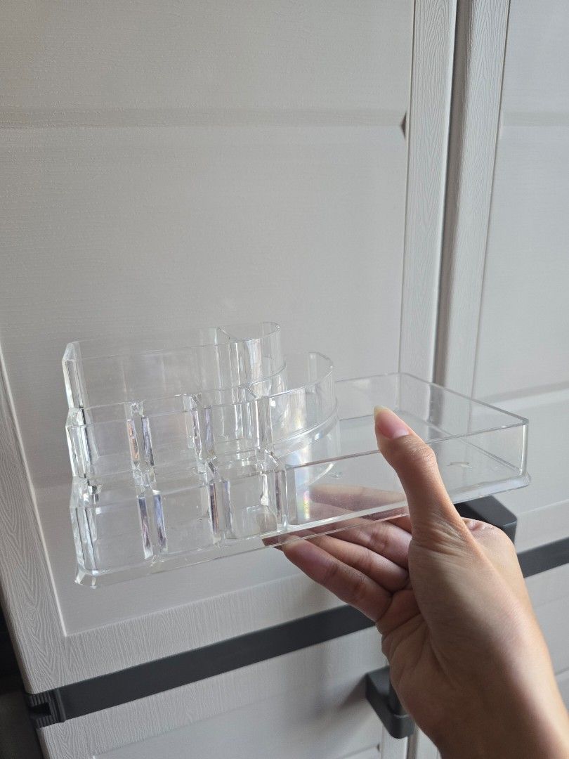 Clear Acrylic Makeup Organizer with Compartments (Category: Makeup) located in Paranaque City. Submitted by ministrwbrry (Listing ID 1450327298, Image 1). Description: - Transparent acrylic organizer - Multiple compartments for makeup and accessories - Keeps your vanity tidy and organized - Clear design for easy visibility of contents - Sturdy build for durability - Ideal for storing brushes, lipsticks, and more.