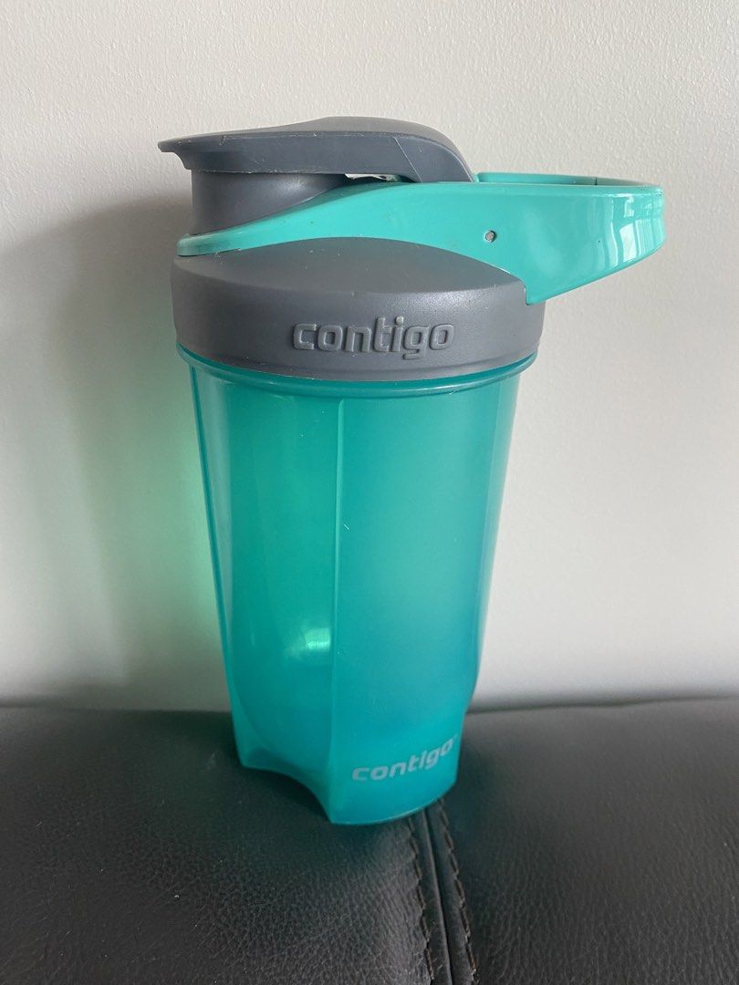 Contigo Shaker Bottle Teal Grey (Category: Water Bottles & Tumblers) located in Quezon City. Submitted by eljivie (Listing ID 1450401144, Image 1). Description: - Contigo shaker bottle in teal and grey - Convenient measurement markings on the side - Easy-to-use flip-top spout for drinking - Ideal for protein shakes and beverages on the go - Clean and ready for its new owner.