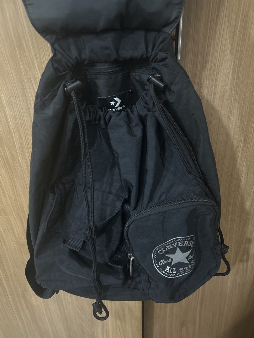 Converse All Star Black Backpack (Category: Backpacks) located in Cebu City. Submitted by chimmyxhy (Listing ID 1450460027, Image 3). Description: - Classic black Converse backpack - drawstring closure - front zip pocket - small front pouch with zip - adjustable shoulder straps for comfort - spacious, medium sized (can fit 13in laptop/ipad) -with back zipper for phone.
