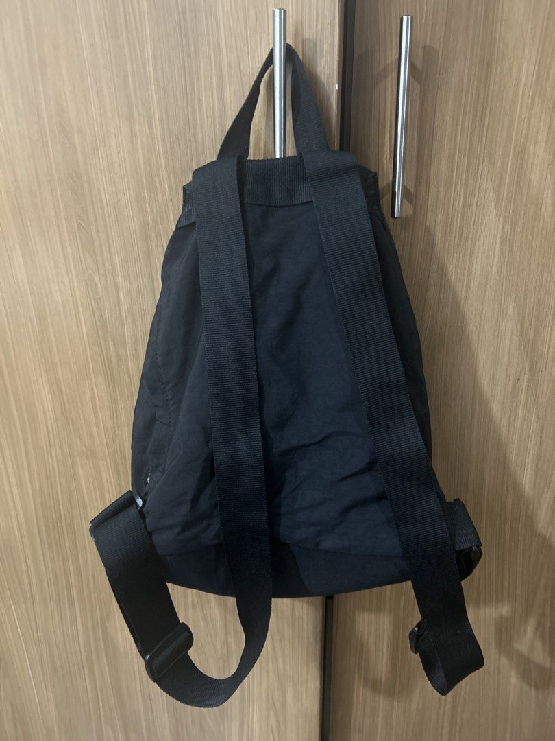 Converse All Star Black Backpack (Category: Backpacks) located in Cebu City. Submitted by chimmyxhy (Listing ID 1450460027, Image 2). Description: - Classic black Converse backpack - drawstring closure - front zip pocket - small front pouch with zip - adjustable shoulder straps for comfort - spacious, medium sized (can fit 13in laptop/ipad) -with back zipper for phone.