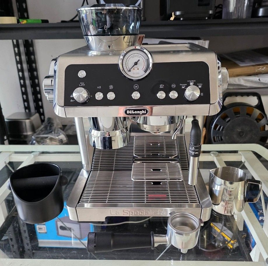 DELONGHI LA SPECIALISTA (Category: Coffee Machines & Makers) located in Bulacan. Submitted by iamvanillapeach (Listing ID 1450526301, Image 1). Description: Delonghi la specialista with built in coffee grinder. Used /good working condition With warranty..