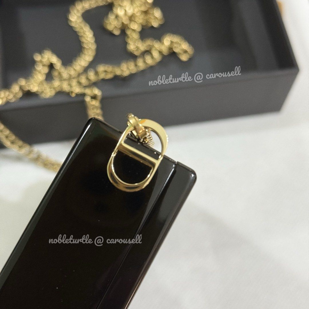 Rouge Dior Minaudiere Clutch with Chain (Category: Luxury Bags & Wallets) located in Santo Tomas. Submitted by nobleturtle_e41485 (Listing ID 1450368074, Image 3). Description: - Authentic Dior Rouge Dior Minaudiere clutch - Can be worn as lipstick case alone or clutch+lipstick case (see pic) - Elegant gold chain strap for versatile wear - Can be used without the chain - Compact features a beautiful engraved design - Perfect for carrying your sma