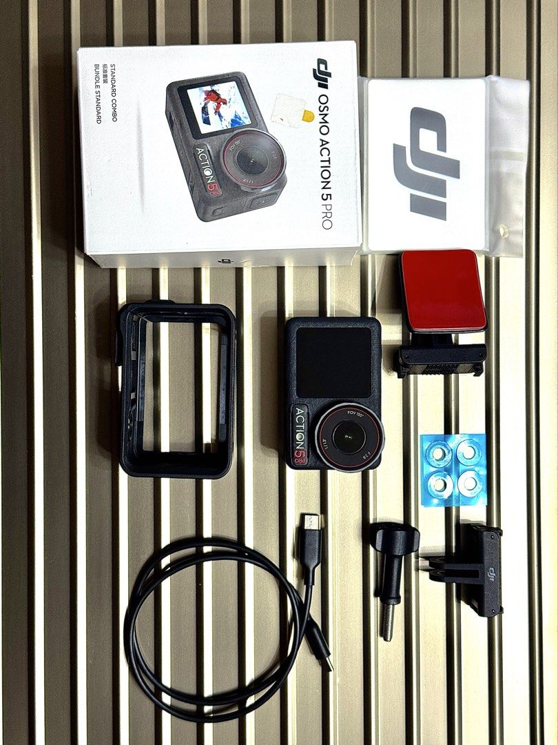 DJI Osmo Action 5 Pro Camera with Accessories (Category: Cameras) located in Manila. Submitted by maryjessa1212 (Listing ID 1450493281, Image 3). Description: DJI ACTION 5 Standard Combo With box and manual Extras: Multifunctional Charging Handle Extended stick Good as new 100% smooth with no dents! Mas makinis pa sa face mo emeee! Used twice only!!! - super quick pa nagamit RFS: May DJl osmo pocket and insta 360 na- di talaga nagagamit, sayang m