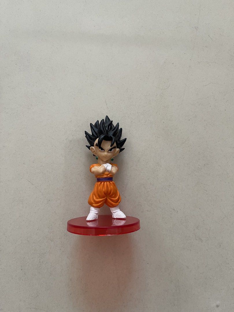 Dragon Ball Z Vegito Chibi Figure (Category: Figurines & Statues) located in Quezon City. Submitted by kingcurator (Listing ID 1450393705, Image 1). Description: - Cute Dragon Ball Z Vegito figure in chibi style. - Stands on a red base. - Approximately 3-4 inches tall. - Comes in a clear plastic ball packaging. - Ideal addition to any Dragon Ball fan's collection..