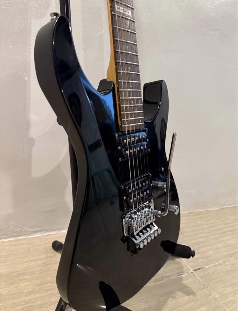 ESP LTD M10FR (Category: Musical Instruments) located in Manila. Submitted by 12tonemusicstudioph (Listing ID 1450344830, Image 3). Description: - Black ESP LTD electric guitar - Equipped with a Floyd Rose tremolo system - Plays well and is ready for its next owner - Ideal for rock and metal genres.