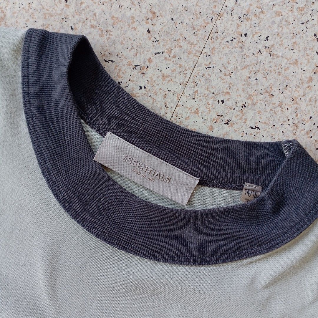 Essentials Fear of God Ringer Tee (Category: Tshirts & Polo Shirts ) located in Maramag. Submitted by kenthrift_ (Listing ID 1450358835, Image 3). Description: Essentials Fear of God Ringer Tee •Very good condition •Size On Tag: 14/18 •Measurements: Width 21 & Length 27 •Collar and sleeves color rate 8.5/10.