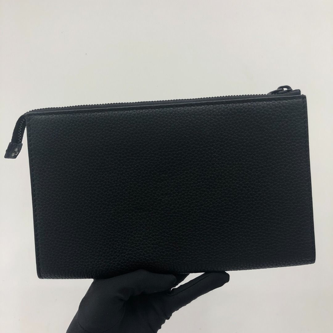FERRAGAMO CLUTCH SLG 267****** (Category: Bags & Wallets) located in Kuala Lumpur. Submitted by ecoring.my (Listing ID 1450427917, Image 2). Description: We’re excited to share that you can now shop EcoRing items anytime on our E-Commerce Website! All items are available exclusively online. Visit us: https://shop.eco-ring.com.my/ Condition: B+ Size: W25 H15.5 D1.5 CM Other defects/info: The top edges and corners have colour change. The back has p