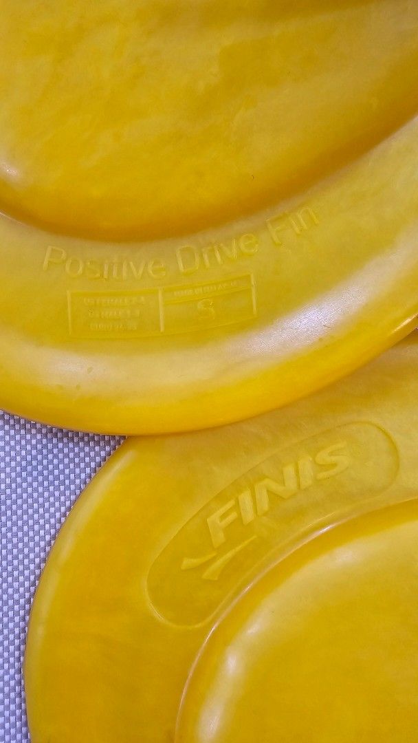 Finis Swimming Training Fins size small (Category: Water Sports) located in Quezon City. Submitted by ilovenystuff (Listing ID 1450480792, Image 3). Description: - FINIS Positive Drive Fins in vibrant Yellow. - Oval-shaped short tail design for enhanced directional propulsion. - Asymmetrical shape and adjustable heel strap for a secure fit. - Excellent for training and building leg strength. - Short and wide tail design assists with adjustments f