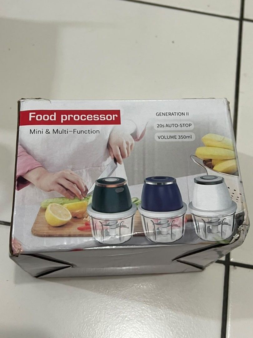 Food Processor Mini & Multi-Function Generation II (Category: Juicers, Blenders & Grinders) located in Penampang. Submitted by yuna80 (Listing ID 1450342197, Image 1). Description: - Mini Food Processor (Generation II) - 350ml capacity - 20s auto-stop function for quick chopping - Perfect for small ingredients - Easy to operate and clean - Comes in original packaging.