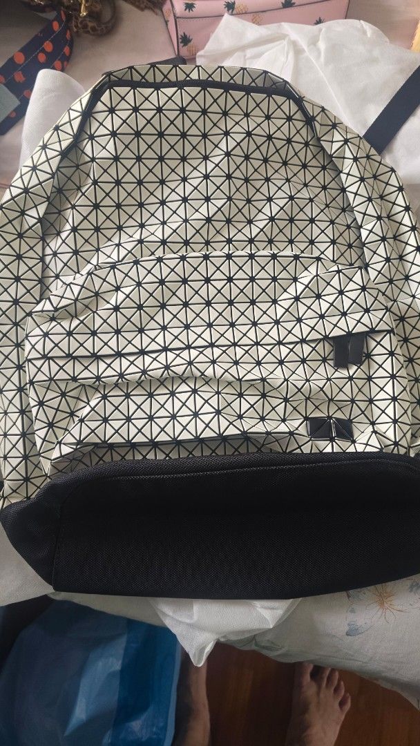 Geometric Pattern Backpack (Category: Backpacks) located in Singapore. Submitted by kiasu123 (Listing ID 1450465068, Image 1). Description: - Eye-catching geometric pattern on the front. - Comfortable black padded straps and back panel. - Standard backpack size, suitable for everyday use. - Ideal for travel with ample interior space..