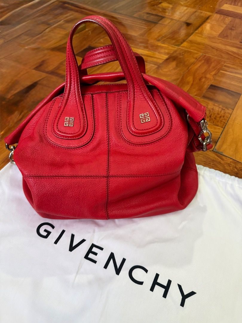 Givenchy Medium Red Leather Nightingale Bag (Category: Luxury Bags & Wallets) located in Quezon City. Submitted by bianxcloset (Listing ID 1450357056, Image 1). Description: - Authentic Givenchy Nightingale Bag - Color: Red Leather - Features iconic Givenchy logo hardware - Spacious interior with zippered pocket - Comes with original dust bag - Ideal for everyday use - Note: Shows some signs of wear on handles and leather.