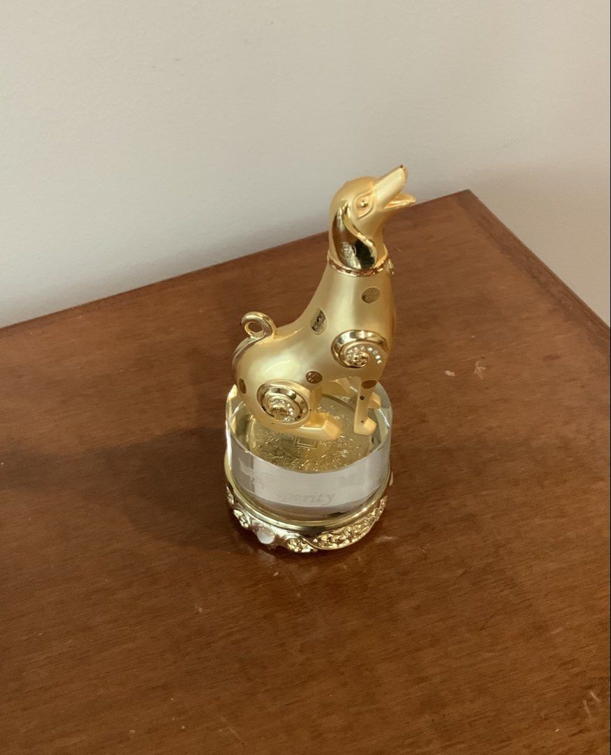 Golden Dog Figurine with Crystal Base (Category: Other Home Decor) located in Makati City. Submitted by nfb1234 (Listing ID 1450392393, Image 3). Description: - Adorable gold dog figurine - Features decorative spots and sparkly accents - Sits on a clear crystal base with writing and gold trim - Ideal for shelf or desk display - Adds charm and elegance to any space Dog figurine represents loyalty and protection RFS - declutter Packaging not origin