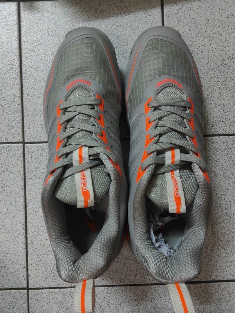 Grays Raid 2.0 Hockey Shoes - Grey UK 8/Eu 42 (Category: Other Sports Equipment and Supplies) located in Kota Kinabalu. Submitted by gwibonn (Listing ID 1450454949, Image 2). Description: Selling because it doesn't fit, too tight on my foot. ( I sized up when buying but still tight. My foot is 26 cm) 📌 ITEM DETAILS & CONDITION: • Condition: 9/10 (Only worn 3 to 4 game) • Color: Grey with an orange ascent. • Size: UK 8 / EU 42 / CM 27.7 • Grips w