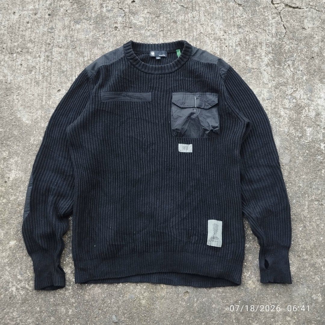 G-Star RAW Black Knit Sweater with Utility Pockets (Category: Coats, Jackets and Outerwear) located in Aguinaldo. Submitted by oddrabbit_3fd558 (Listing ID 1450320906, Image 1). Description: - Brand: G-Star RAW - Color: Black - Size: L - Material: Knit - Features: Ribbed texture, utility chest pockets, reinforced shoulder and elbow patches, thumbholes on cuffs - Style: Great for layering.