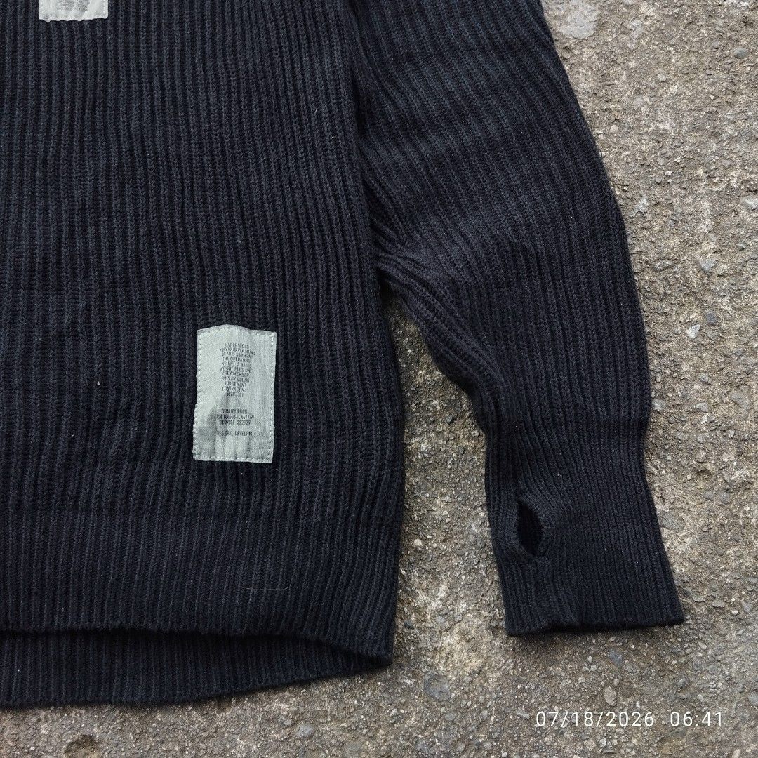 G-Star RAW Black Knit Sweater with Utility Pockets (Category: Coats, Jackets and Outerwear) located in Aguinaldo. Submitted by oddrabbit_3fd558 (Listing ID 1450320906, Image 3). Description: - Brand: G-Star RAW - Color: Black - Size: L - Material: Knit - Features: Ribbed texture, utility chest pockets, reinforced shoulder and elbow patches, thumbholes on cuffs - Style: Great for layering.