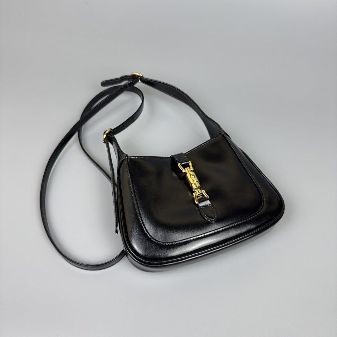 Gucci - Black Jackie Mini Shoulder Bag (Category: Luxury Bags & Wallets) located in Quezon City. Submitted by japon_rose (Listing ID 1450349185, Image 3). Description: READ DESCRIPTION FIRST BEFORE YOU START A DEAL Please check each photo for the details of the bag Gucci - Black Jackie Mini Shoulder Bag (2 way can convert it to hand bag) Color: Black Can fit any phone even IPhone PM also can fit powerbank etc with card slot Dimensions: Length: 5 