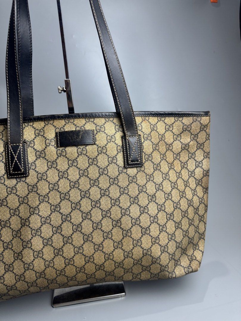 Gucci - GG Coated Canvas - Tote Bag (Category: Luxury Bags & Wallets) located in San Pablo. Submitted by hiddenrygn (Listing ID 1450439683, Image 2). Description: Gucci - GG Coated Canvas - Tote Bag Rank B Signs of usage Discoloration Still usable Authentic DM!.