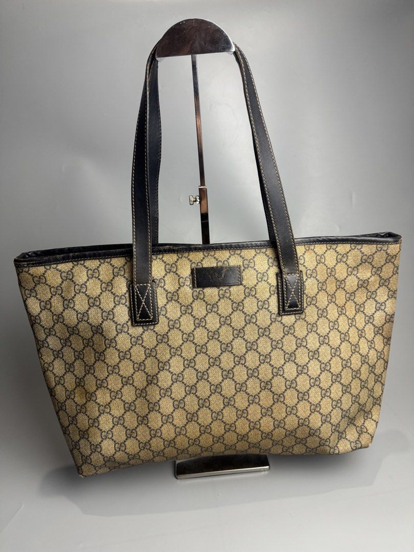 Gucci - GG Coated Canvas - Tote Bag (Category: Luxury Bags & Wallets) located in San Pablo. Submitted by hiddenrygn (Listing ID 1450439683, Image 1). Description: Gucci - GG Coated Canvas - Tote Bag Rank B Signs of usage Discoloration Still usable Authentic DM!.