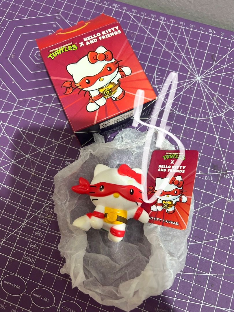 Hello Kitty x TMNT Raphael Figure with Box (Category: Figurines & Statues) located in Lucena. Submitted by fierceeagle.b8d002 (Listing ID 1450497461, Image 1). Description: - Cute Kitty x Teenage Mutant Ninja Turtles Raphael figure - Includes original box and tag - Ideal for collectors - Fun crossover item - Limited availability, grab it now!.