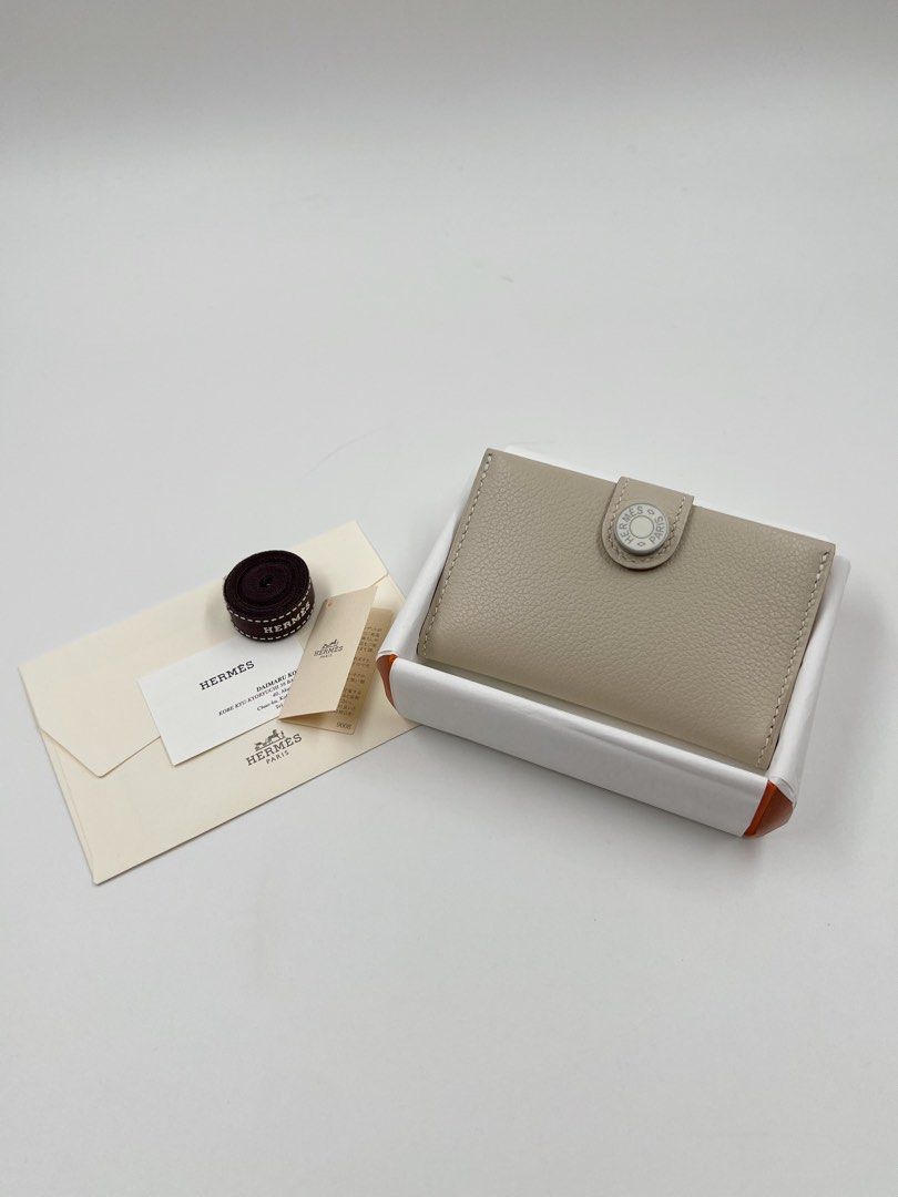⚜️Hermes RMS Ivory card holder (Category: Luxury Bags & Wallets) located in Makati City. Submitted by 90sangel (Listing ID 1450492535, Image 3). Description: •Item: Hermes Card holder 💳🪪 ivory 🍦🐚 ✨ •Condition: Gently Used, Good as New! *Card holder in Evercolor calfskin - Snap closure - 2 credit card slots on each side As this product is handmade, the dimensions indicated may vary. Made in France Metallic finish: Palladium plated Dimensions: 