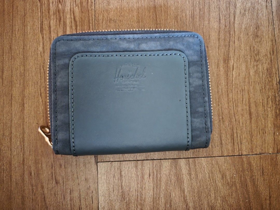 Herschel Supply Co. Zipper Wallet (Category: Wallets & Card holders) located in Manila. Submitted by philgabjhn (Listing ID 1450407718, Image 1). Description: - Herschel Supply Co. wallet - Dark green color - Secure zipper closure - Multiple card slots inside - Compact and pocket-friendly size - Stylish gold zipper detail - Ideal for daily essentials.