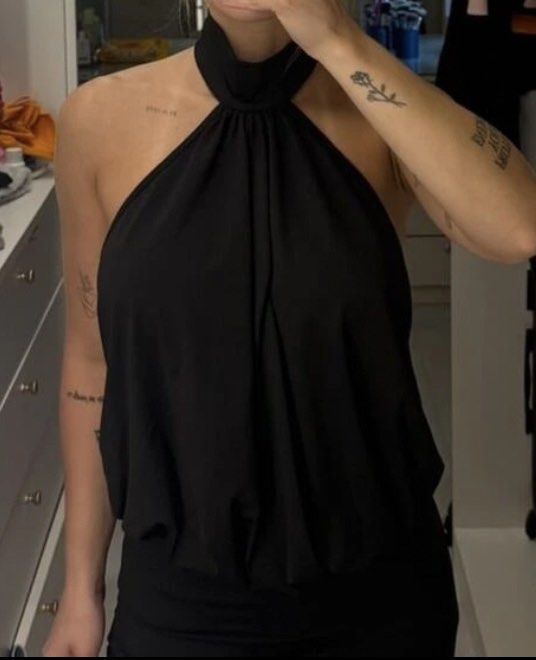 High Neck Backless Ruffle Mini Bodycon Dress (Category: Dresses) located in Caloocan City. Submitted by abbyslv (Listing ID 1450370900, Image 2). Description: Size: Medium.