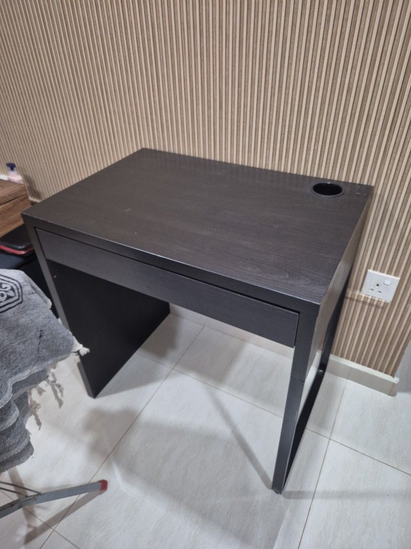 IKEA Computer Table (Category: Tables & Sets) located in Singapore. Submitted by mybmz (Listing ID 1450423917, Image 1). Description: - Ikea computer table - Features a convenient drawer for storage - Includes a side hole, perfect for cable management - Compact design fits perfectly next to sofas or beds.