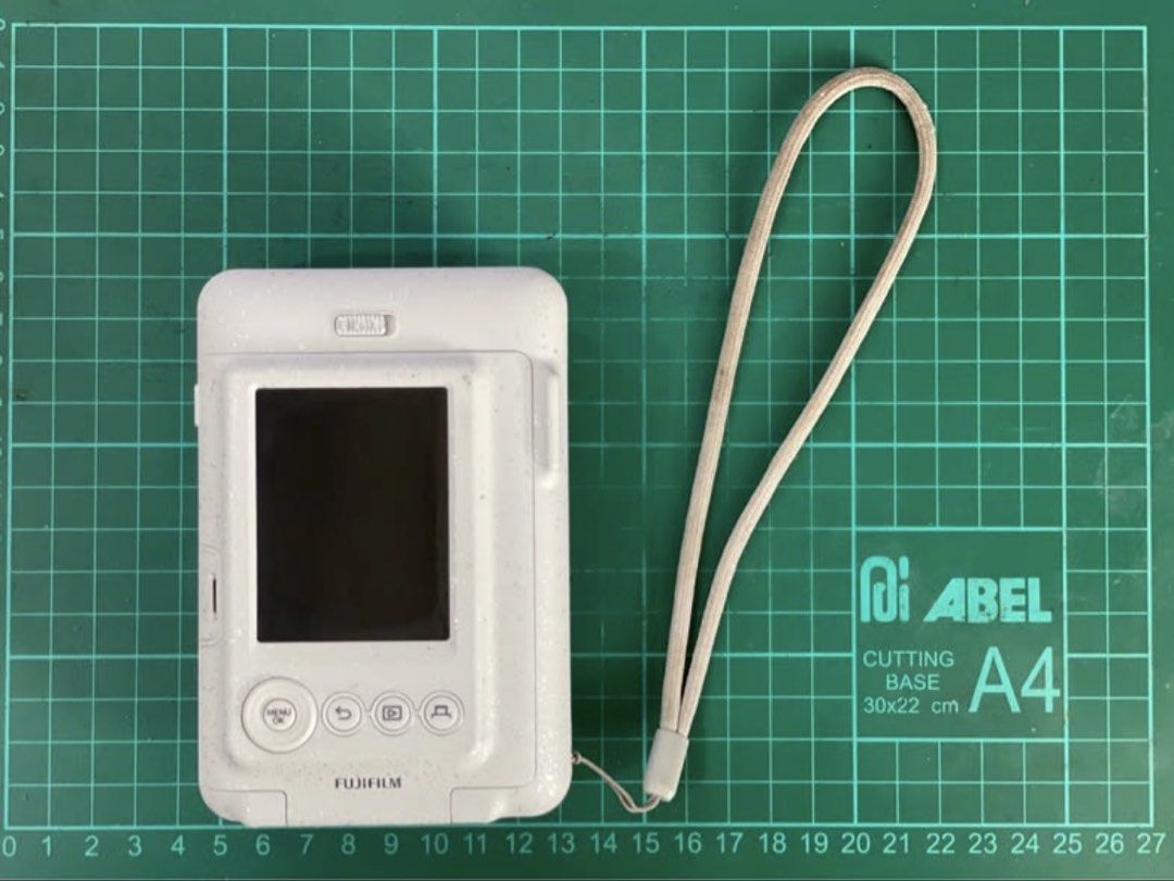 Instax Mini LiPlay Digital/Instant Camera (Stone White) (Category: Cameras) located in Manila. Submitted by ykjstn (Listing ID 1450400805, Image 3). Description: FS/LFB Instax Mini LiPlay (Stone White) Hybrid Digital/Instant Camera Php 6,500 - 📍UP Diliman/QC or Makati CBD Condition: minor signs of wear (light scratches/scuffs on the small selfie mirror: does not affect image quality) Includes Instax Mini LiPlay Unit (Stone White) with Hand Strap