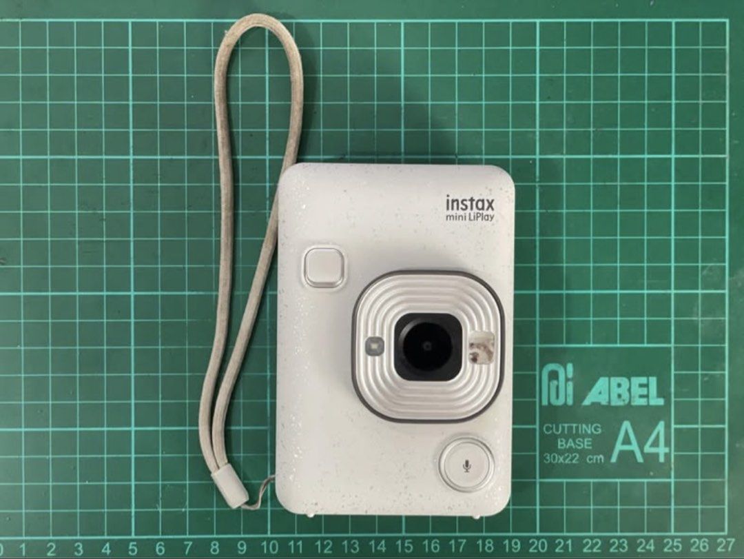 Instax Mini LiPlay Digital/Instant Camera (Stone White) (Category: Cameras) located in Manila. Submitted by ykjstn (Listing ID 1450400805, Image 2). Description: FS/LFB Instax Mini LiPlay (Stone White) Hybrid Digital/Instant Camera Php 6,500 - 📍UP Diliman/QC or Makati CBD Condition: minor signs of wear (light scratches/scuffs on the small selfie mirror: does not affect image quality) Includes Instax Mini LiPlay Unit (Stone White) with Hand Strap