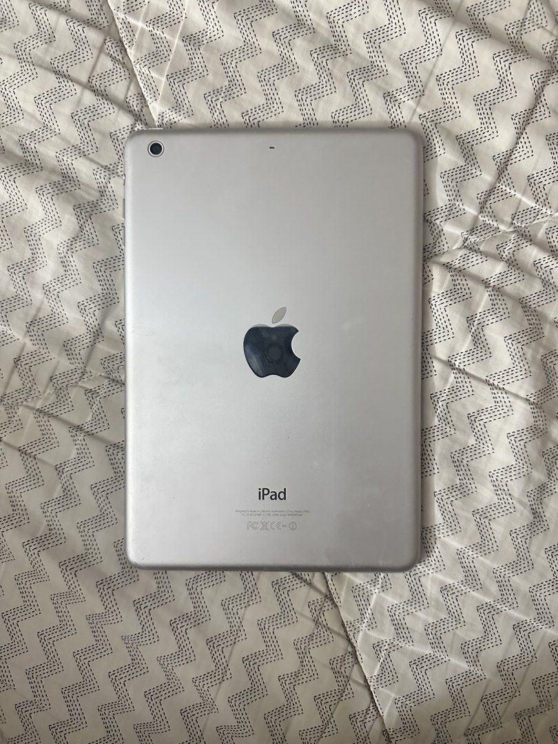 iPad Mini 2 (NEGOTIABLE!!!) (Category: iPad) located in Quezon City. Submitted by thrifthings (Listing ID 1450482624, Image 1). Description: iPad Mini 2 Silver 32 gb - Has a few small scratches at the back as shown in the photo - Home button doesn’t work anymore, it cannot be clicked - LCD screen has been replaced multiple times. There’s a mark from the LCD screen as shown in the photo - Battery is still okay! It lasts me the whole day if I read 
