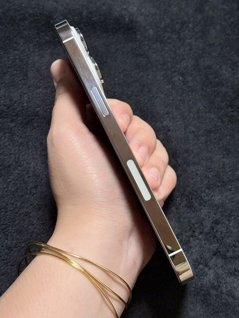 iPhone 14 Pro Max 512gb (Category: iPhone 14 Series) located in Rizal. Submitted by preloved.nica (Listing ID 1450443840, Image 2). Description: Details: * White * 512GB * US Variant (eSIM only) * Bought in the US * With original box * 86% Battery Health * LCD Replacement * True Tone Working * No dents * In good and crisp condition.