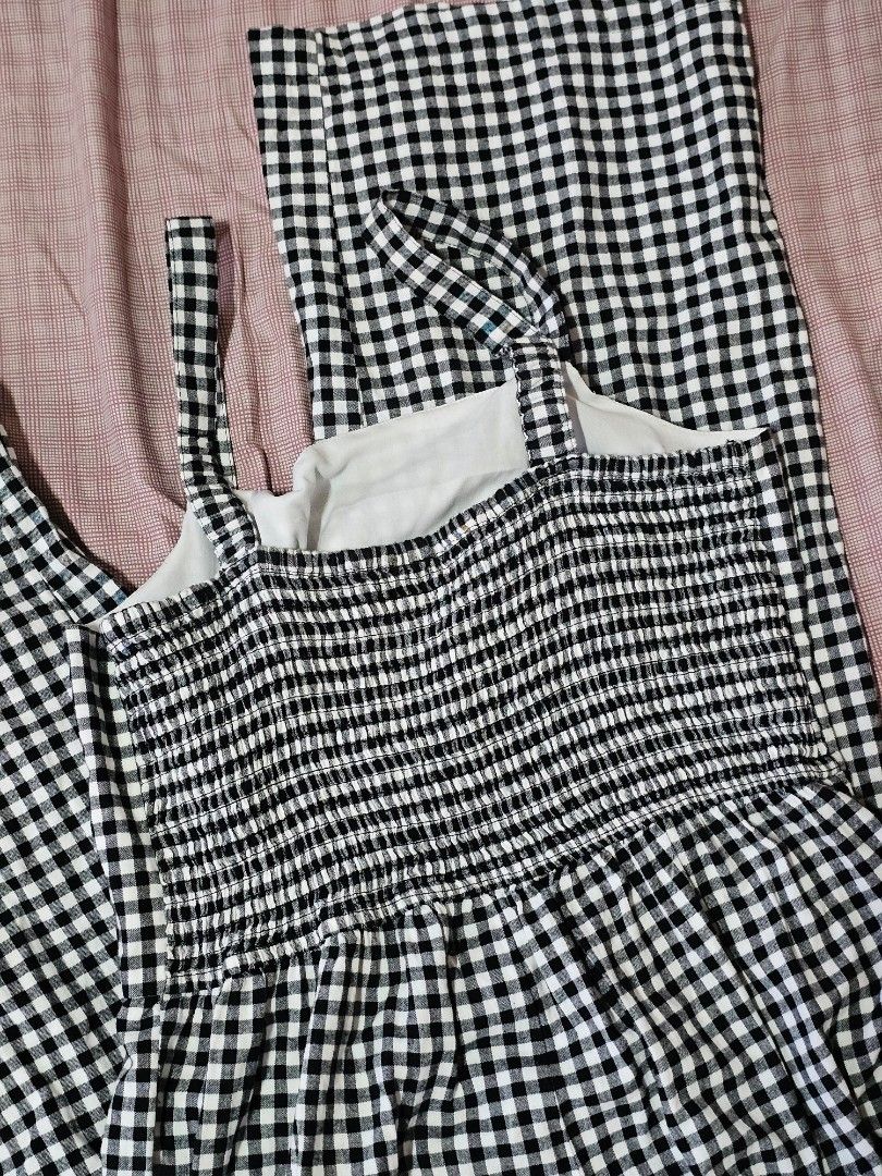 JAPNA Checkered Smocked Romper [L] (Category: Rompers) located in Quezon City. Submitted by declutterwithnari (Listing ID 1450352000, Image 2). Description: JAPNA Checkered Smocked Romper - Color: Black and White - Size: Large (Fits until semi-xl frame) - In good condition, doesn't fit me anymore that's why I decided to sell it. This is semi-nego! Message me for the last price! MOP: GCash, GoTyme, Maya (payment first) MOD: Lalamove, Grab, J&T (it