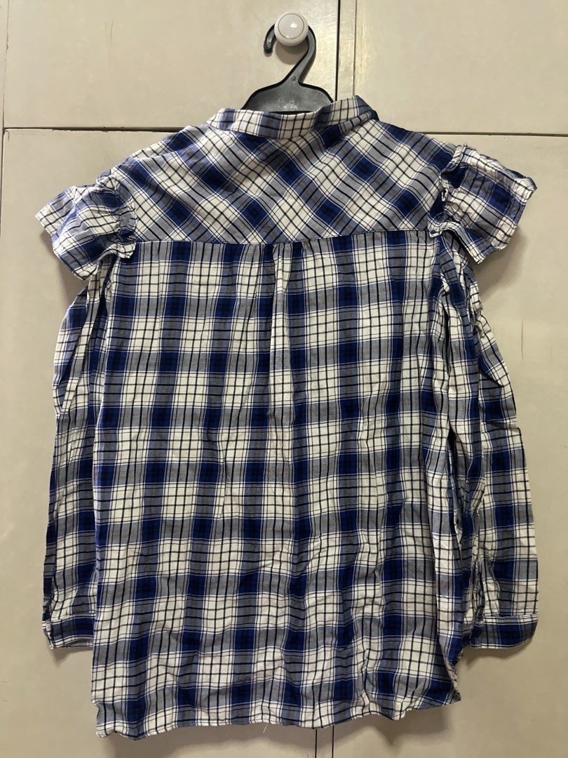 JOIN LIFE Blue Plaid Button-Up Shirt (Category: Longsleeves) located in Quezon City. Submitted by lespyjamas (Listing ID 1450401130, Image 2). Description: - JOIN LIFE blue and white plaid shirt - Button-up front with collar - Short sleeves with ruffled detail - Comfortable and casual design - Ideal for everyday wear - size 13/14 .