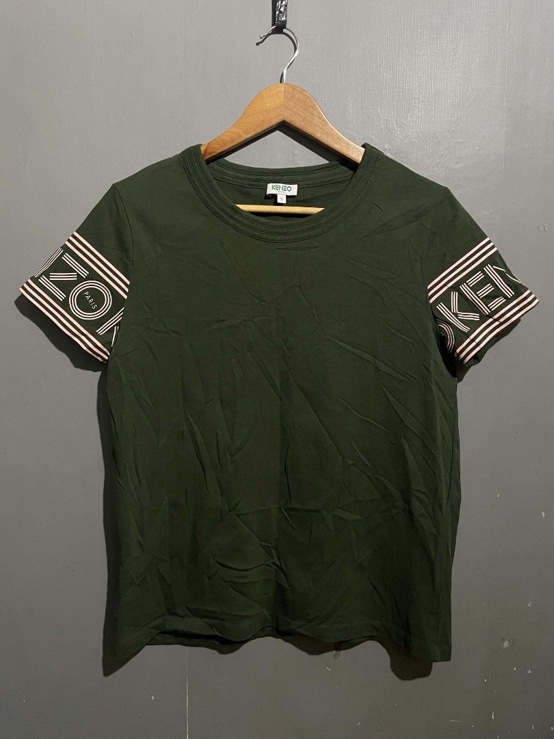 Kenzo Paris Sleeve Band Tee (Category: Tshirts & Polo Shirts ) located in Manila. Submitted by thriftinglikewise (Listing ID 1450496481, Image 1). Description: WIDTH 18 LENGTH 24 SIZE SMALL ON TAG Asnew Condition Color Rate 9.7/10.