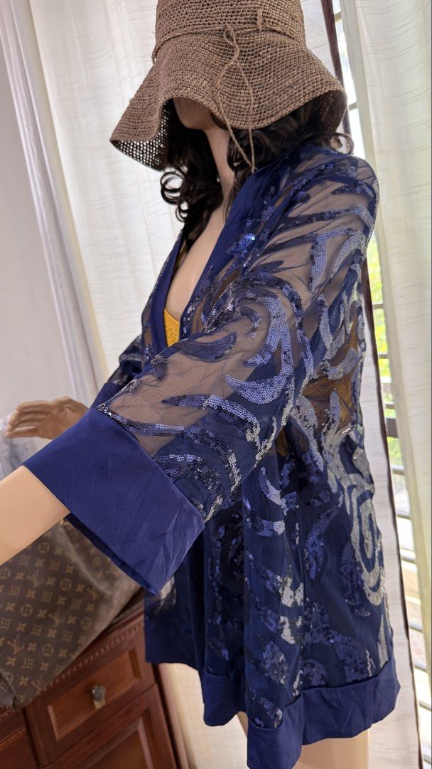 Kimono Cover up (Category: Coats, Jackets and Outerwear) located in Malolos. Submitted by flapnbloom.ph (Listing ID 1450331085, Image 2). Description: - Sheer Navy Blue Kimono Jacket with Sequins with tag - Wide sleeves - Size: M to XL.