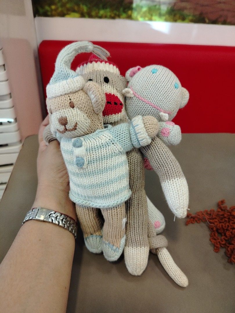 Knitted Teddy Bear, Monkey, and Cat Plush Toys (Category: Plushies & Soft Toys) located in Manila. Submitted by purediamond888 (Listing ID 1450417057, Image 1). Description: - Set of 3 cute knitted plush toys - Includes a teddy bear in pajamas, a monkey in a hat, and a cat - All three toys are hugging each other - Soft and cuddly material - Ideal for children's play or as a charming decoration - Makes a perfect gift.