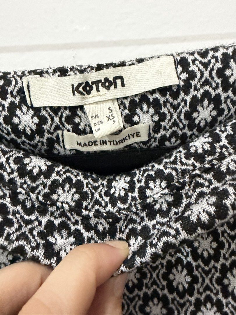 Koton Black & White Patterned Flared Mini Skirt XS (Category: Skirts) located in Taguig. Submitted by onein.oneout_declutter (Listing ID 1450439917, Image 2). Description: - Cute Koton mini skirt - Black and white geometric pattern - Flared hemline - Estimated size: XS - Made in Turkey - Versatile for casual or dressed-up occasions.