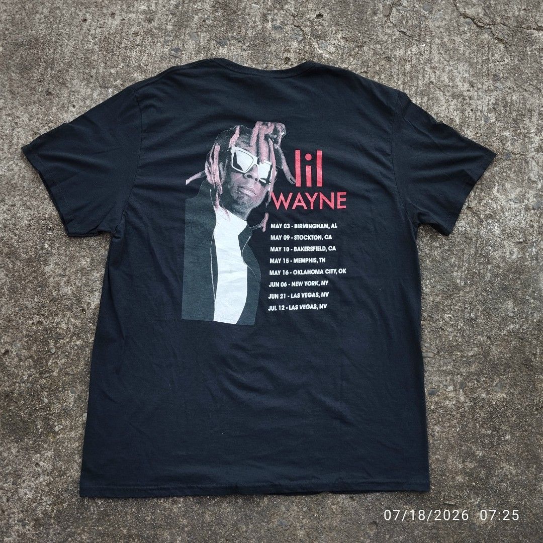 Lil Wayne Graphic T-Shirt XL (Category: Tshirts & Polo Shirts ) located in Aguinaldo. Submitted by oddrabbit_3fd558 (Listing ID 1450320905, Image 2). Description: - Size: XL - Color: Black - Graphic Print: Features multiple images of Lil Wayne on the front and back. - Design Details: Artist's name in red on the front, tour dates on the back. - Brand: Fruit of the Loom - Condition: (Please specify condition if known, e.g., Brand New, Used - Excell