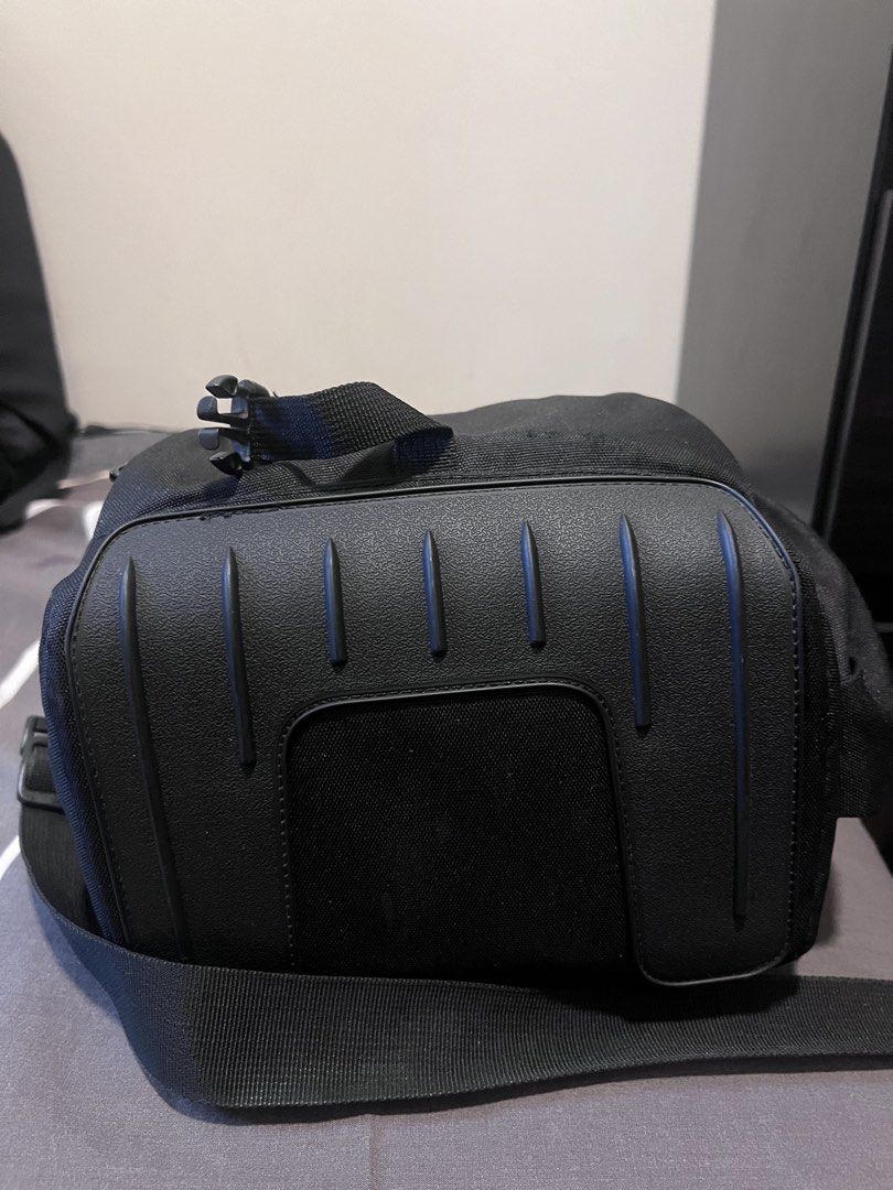Lowepro Camera Bag (Category: Camera Bags & Carriers) located in Makati City. Submitted by bonjamora (Listing ID 1450368626, Image 3). Description: - Brand: Lowepro - Color: Black with orange trim - Interior: Adjustable dividers for camera and lenses - Features: Small zippered pocket inside lid - Includes: Shoulder strap - Benefit: Excellent protection for your camera gear.