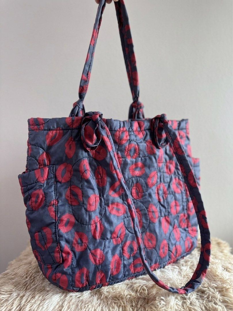 Marc by Marc Jacobs Quilted Lips Tote Bag (Category: Luxury Bags & Wallets) located in Quezon City. Submitted by rosell.xoxo (Listing ID 1450357066, Image 2). Description: - Fun and quirky tote bag from Marc by Marc Jacobs. - Quilted design - Spacious and clean interior - Handles are tied at the top. - Great for everyday use.