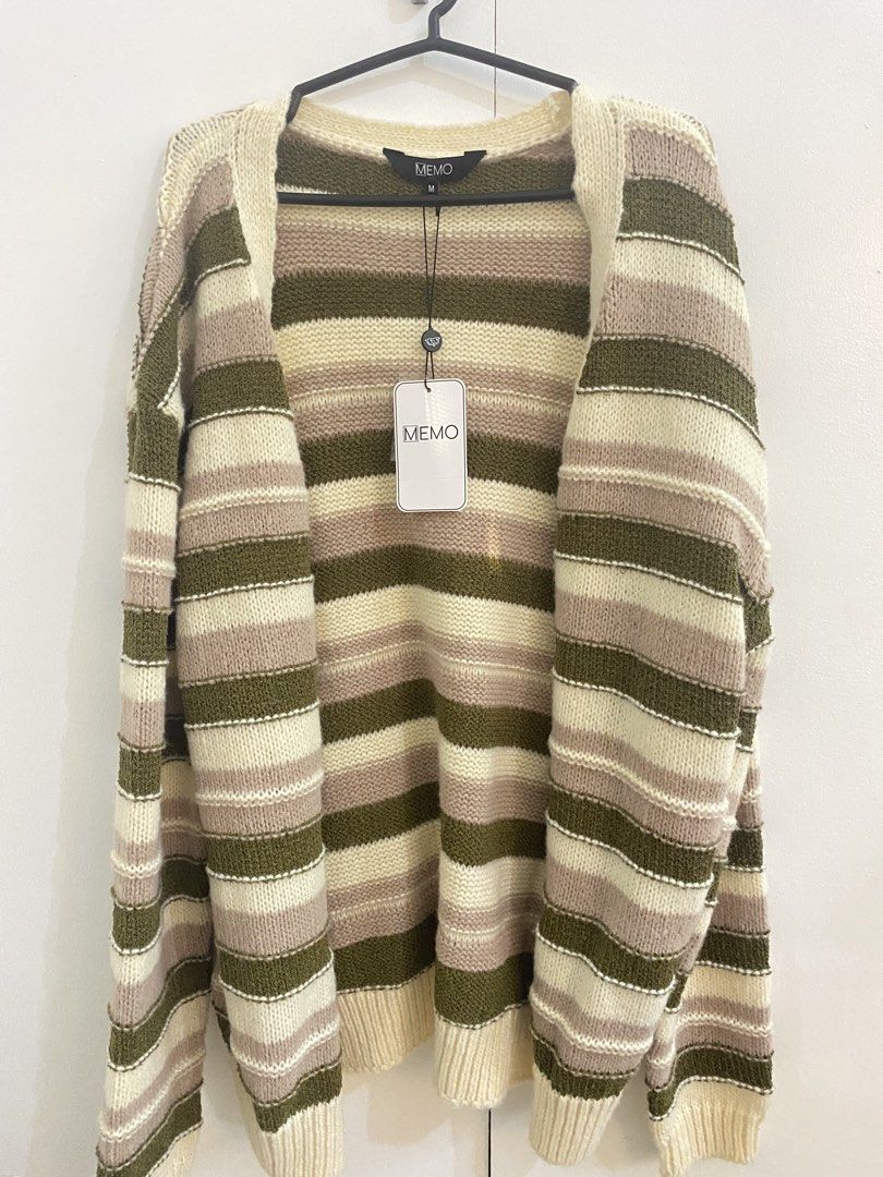 MEMO Striped Knit Cardigan - Size M (Category: Coats, Jackets and Outerwear) located in Manila. Submitted by larajaysong (Listing ID 1450423728, Image 1). Description: - Cute MEMO striped knit cardigan - Colors: Cream, beige, olive green, and pinkish-brown stripes - Size: Medium (M) - Condition: New with original tags attached small bleach stain on the inside - Style: Great layering piece for cooler weather - Versatile: Easy to style with jeans o