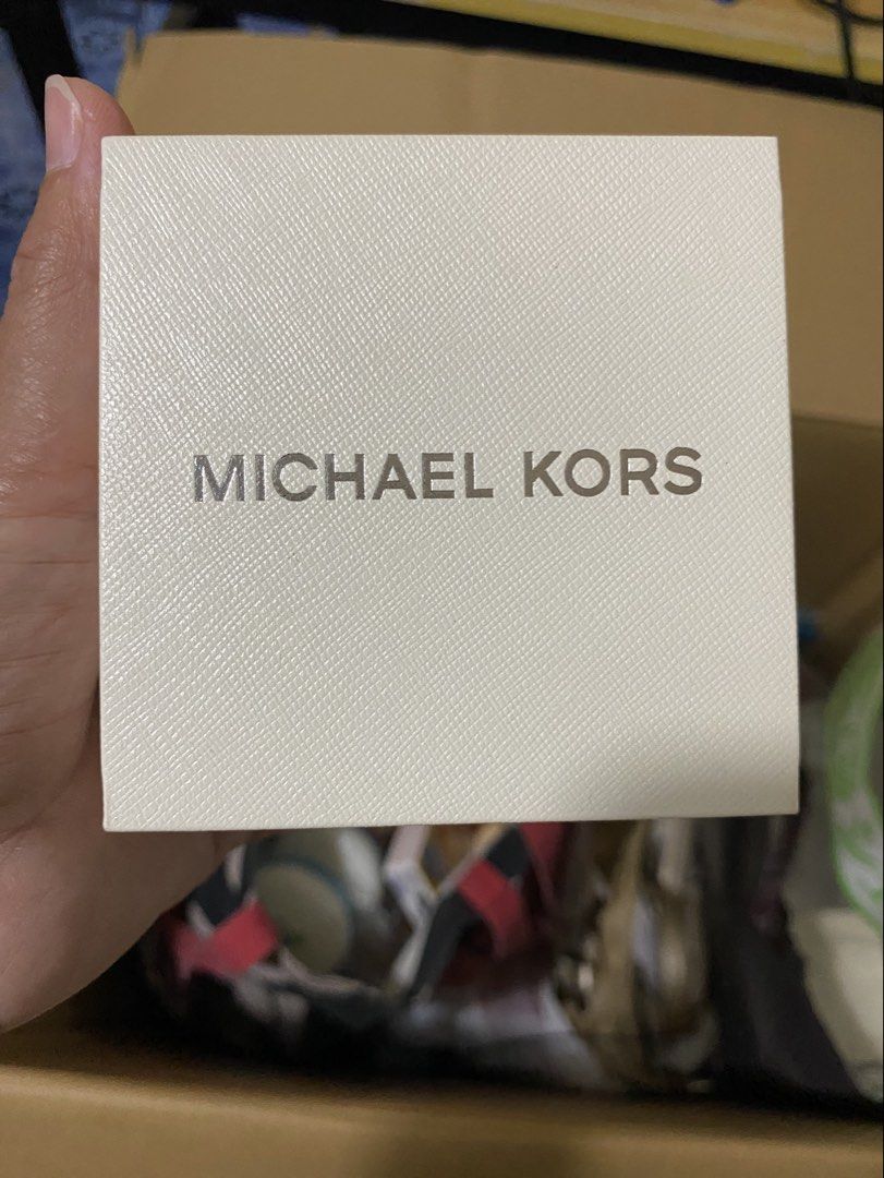 Michael Kors Rose Gold Chronograph Watch (Category: Luxury Watches) located in Pasig City. Submitted by elise.ensembles28 (Listing ID 1419799673, Image 3). Description: Michael Kors Bradshaw Rose Gold Stainless Steel Watch (MK5799), featuring a rose gold-toned dial and a 37mm case. Brand/Model: Michael Kors MK5799 Bradshaw. Material: Rose gold-plated stainless steel. Features: Chronograph functionality with a date display at 3 o’clock. Case Size: